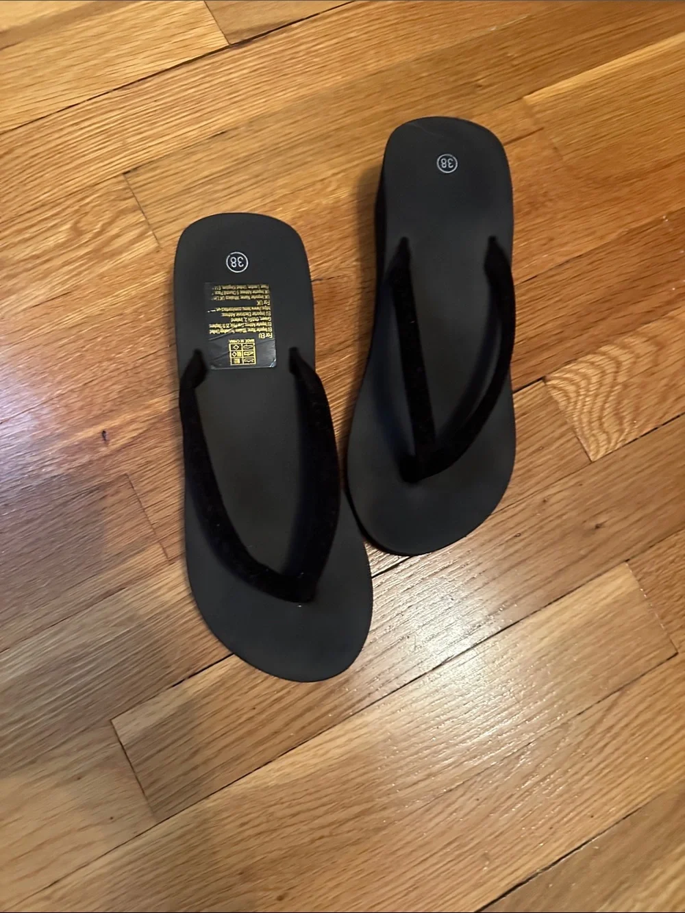 Wedge flip flop black size 7